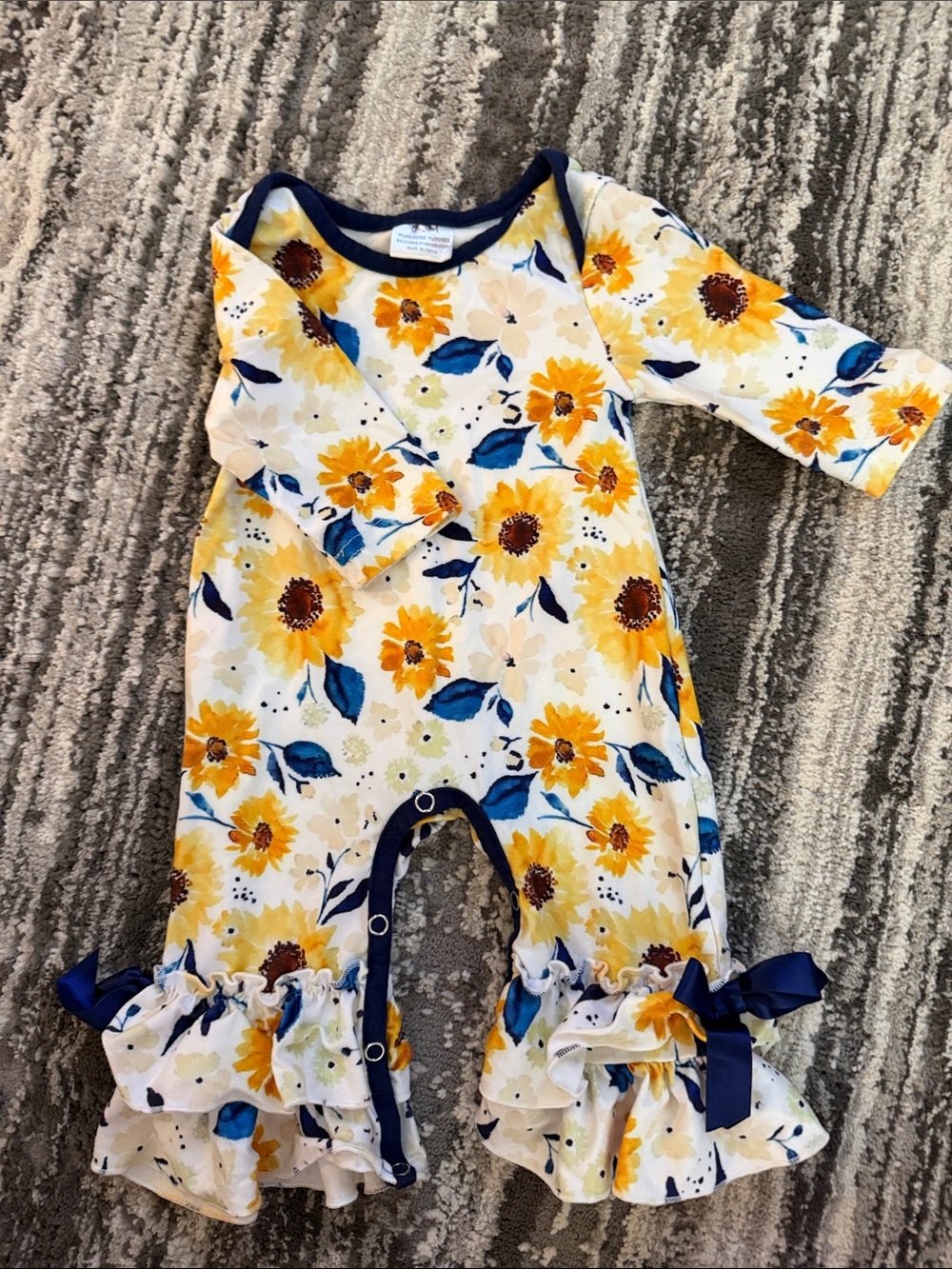 Sunflower Ruffle Baby Romper with Navy Trim